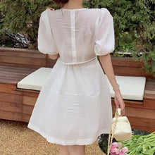 Load image into Gallery viewer, French Summer Women Vintage White Black Dresses Fashion Holiday Puff Sleeve Sexy Hollow Out Waist Party Robe Chain Slim Vestidos