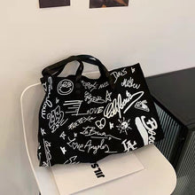 Load image into Gallery viewer, New style simple canvas fashion western style graffiti ladies single shoulder bag